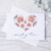 Notecard with watercolor heart filled with peonies, daisies and leaves. Text in calligraphy below reading "sending love"